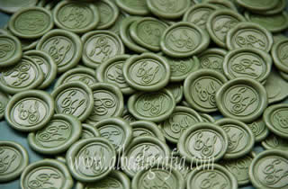 Medallones de lacre verdes con iniciales ES